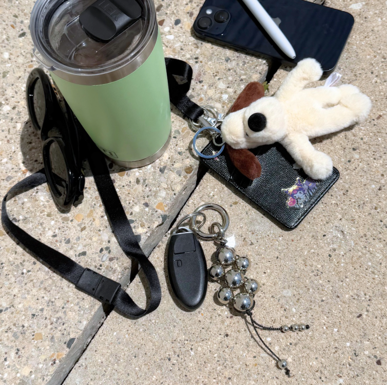 Modern Talisman Chrome Beaded Bag Charm styled with keys, wallet, plush charm, tumbler, and phone, showcasing its everyday carry aesthetic.