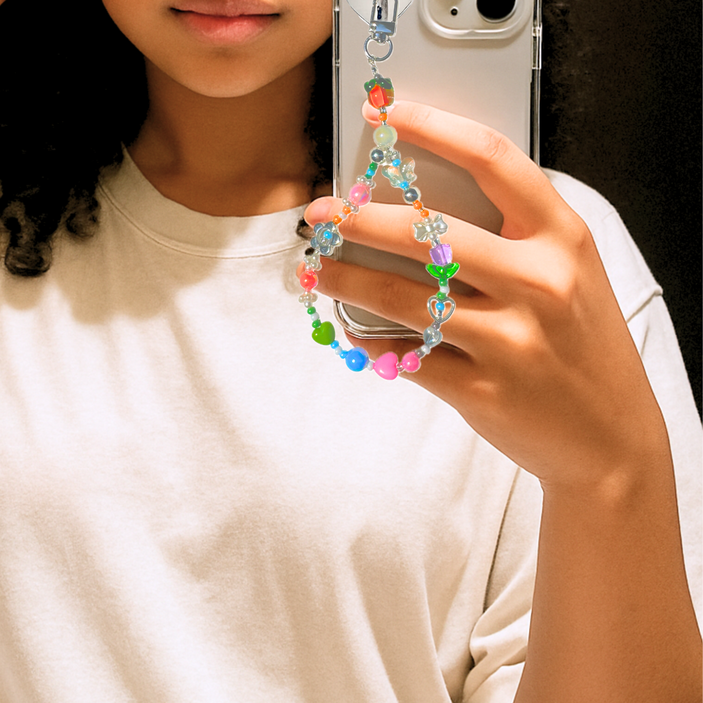 Model holding cute colorful phone charm
