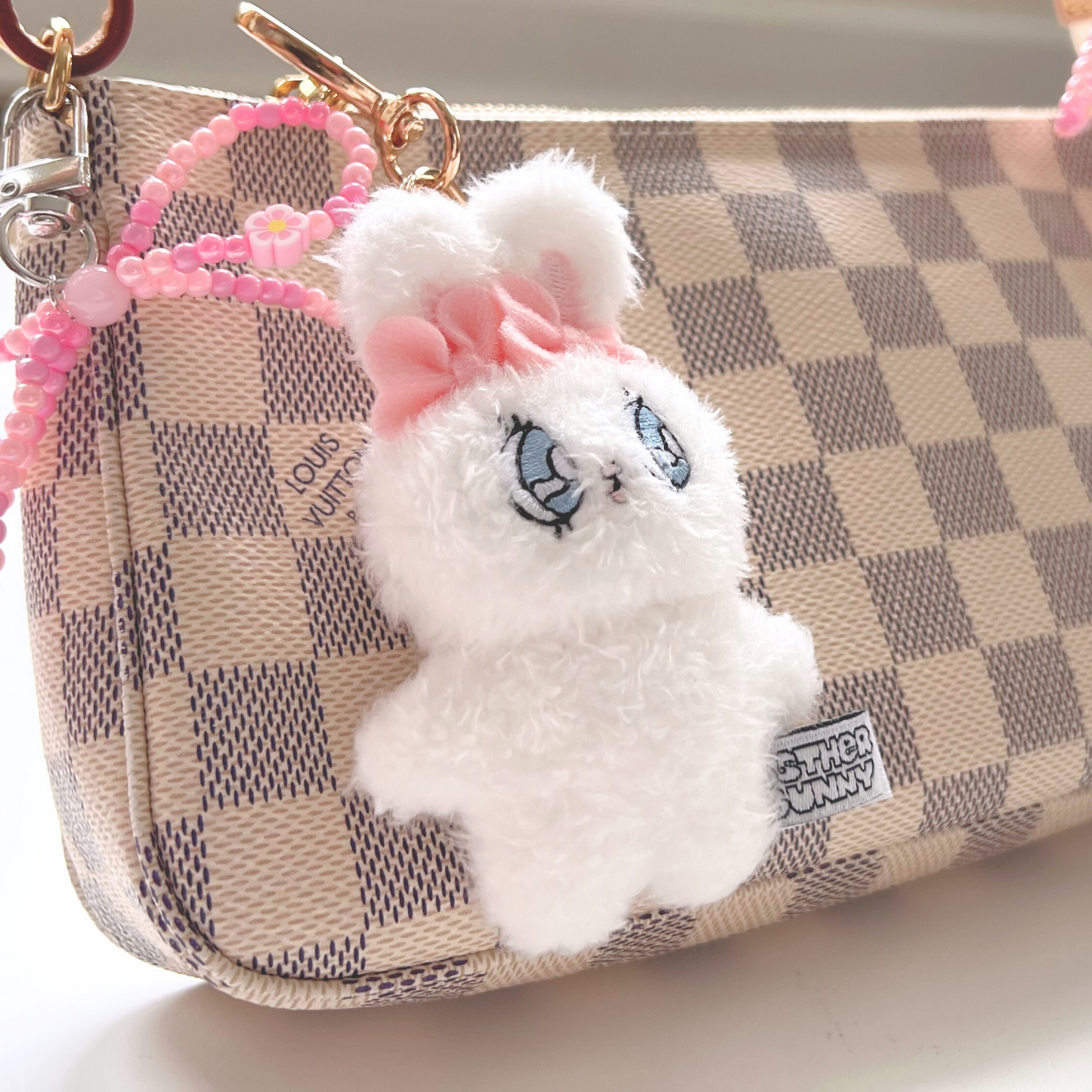 Esther Bunny Plush bag charm on Louis Vuitton