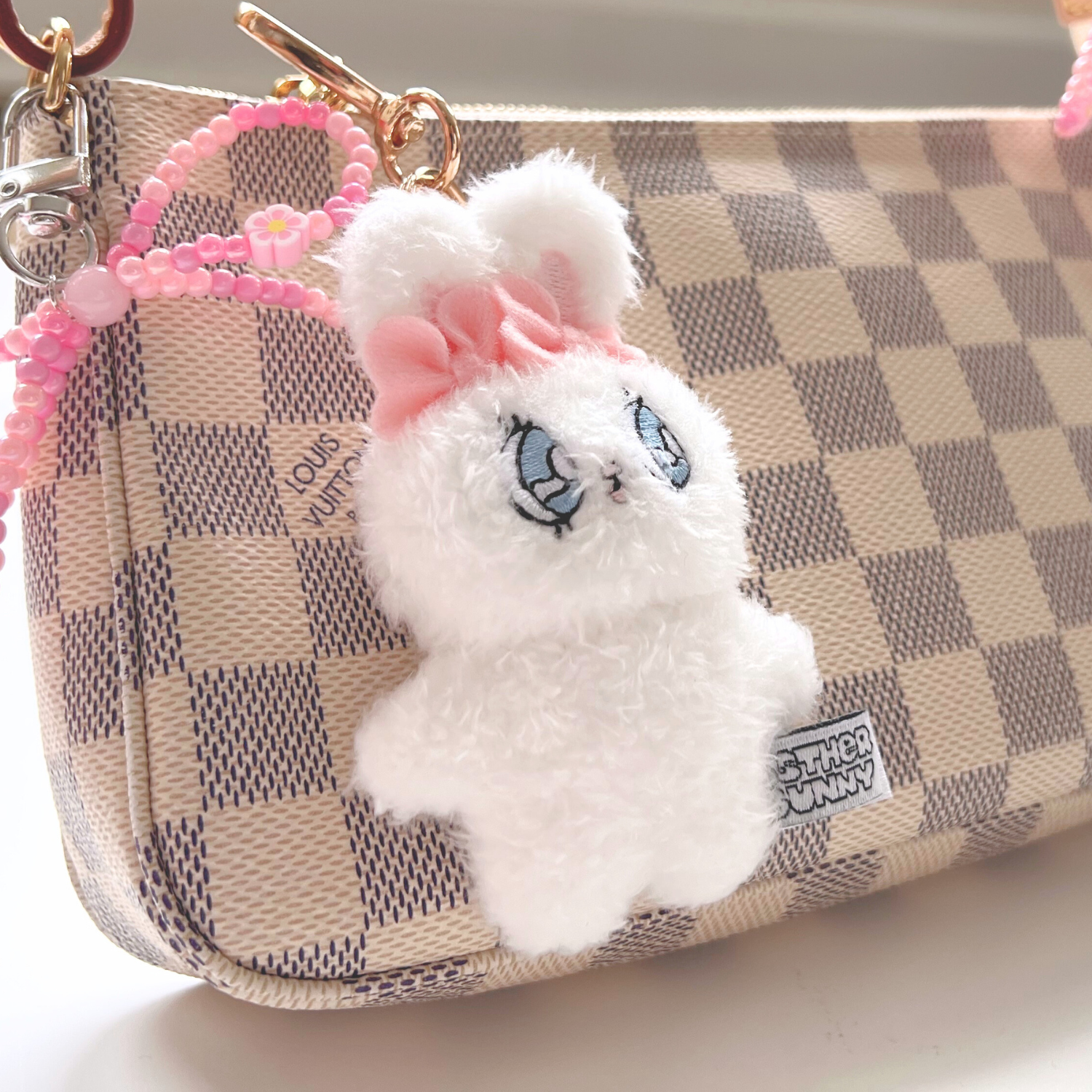 Esther Bunny Plush bag charm on Louis Vuitton