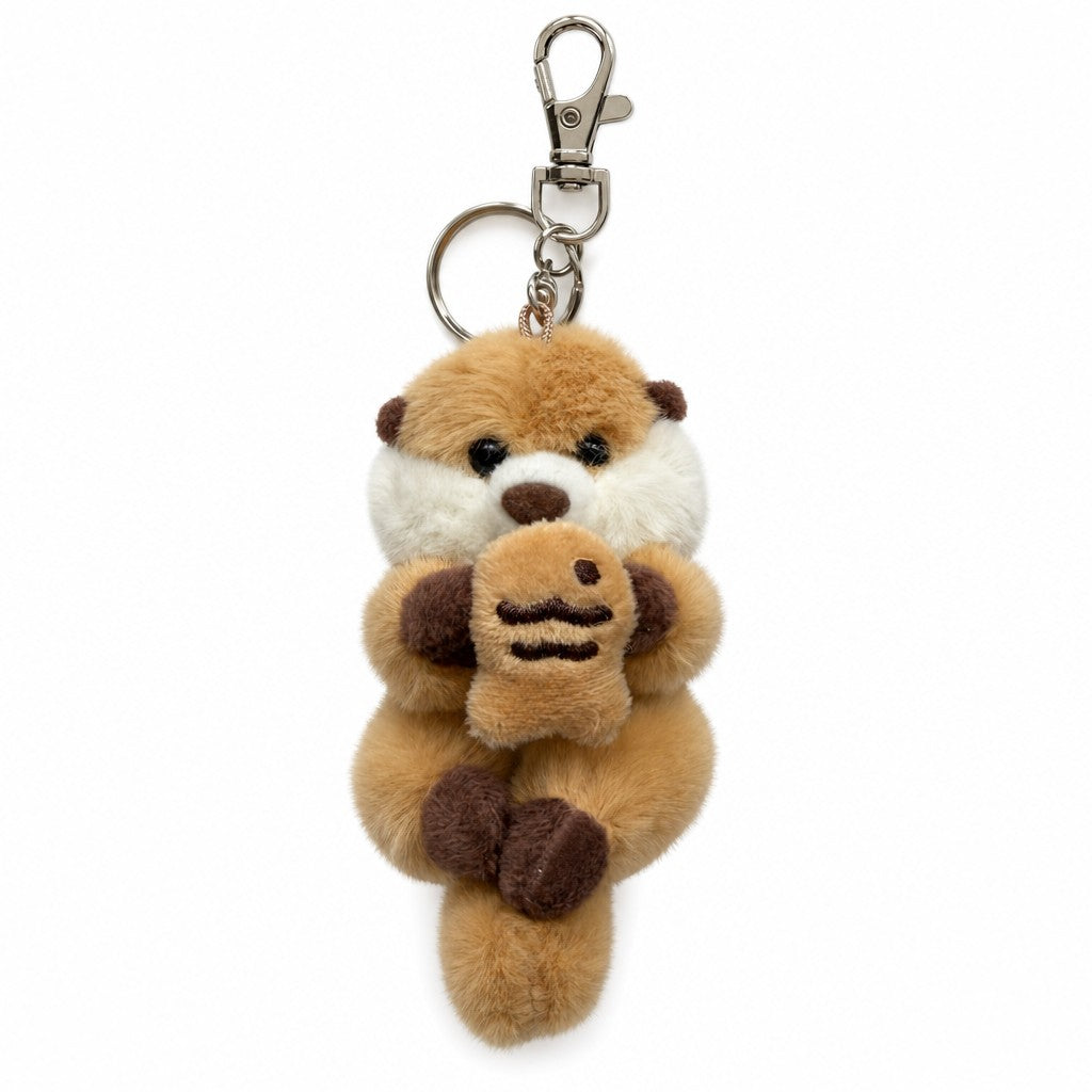 Kawaii Japanese Otter Rakko-san plush keychain bag charm holding a taiyaki, front view