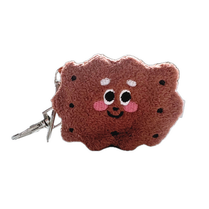 Chocolate sandwich cookie plush keychain featuring a smiling embroidered face, pink cheeks, and chocolate chip accents with silver keychain clip.