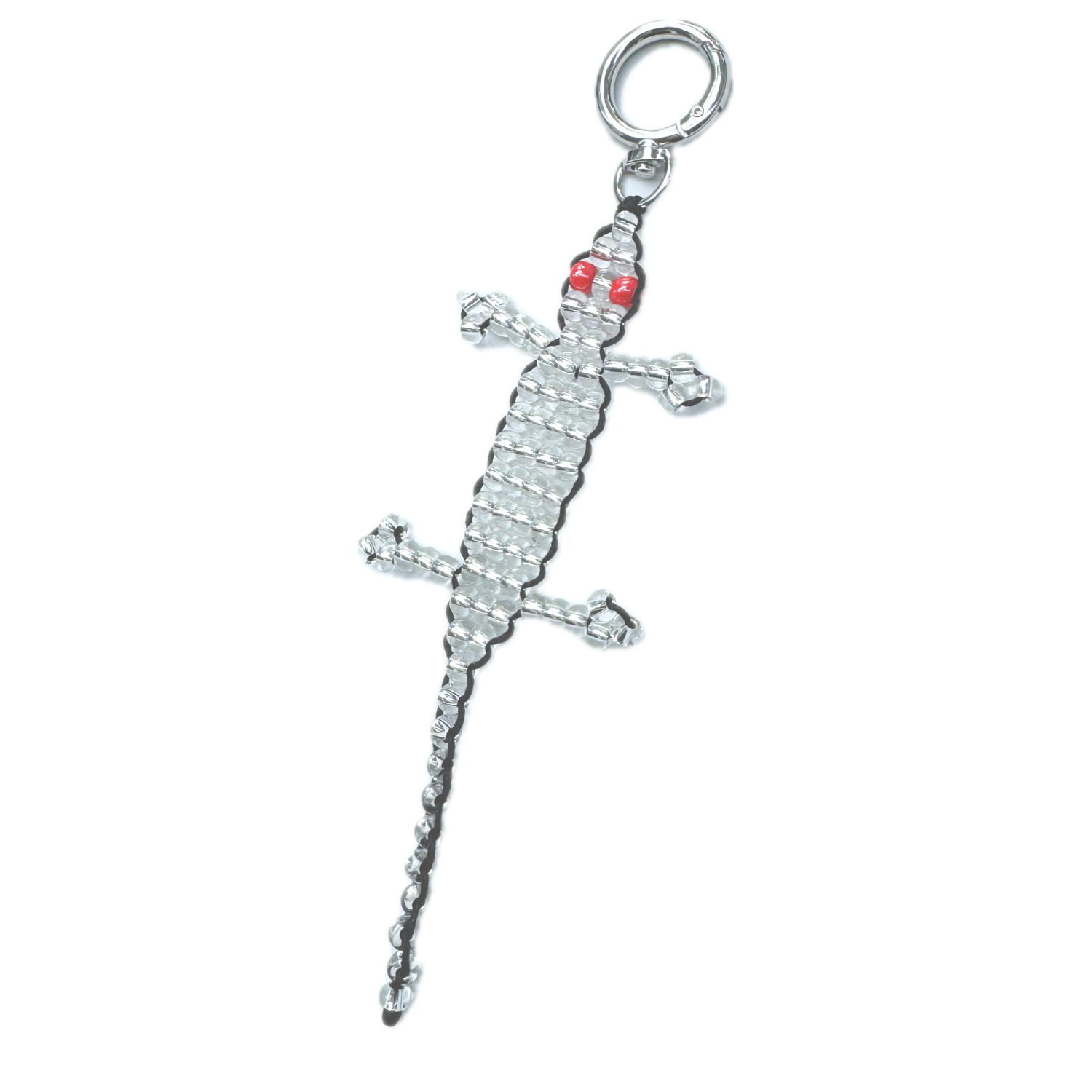 Angled view of the Beaded Silver Gecko Bag Charm, featuring silver glass beads with vivid red bead eyes and a secure keyring clasp.