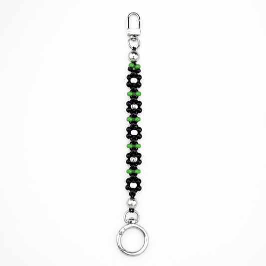 Handmade black and green daisy beaded ID badge holder with silver clasp, cute office accessory