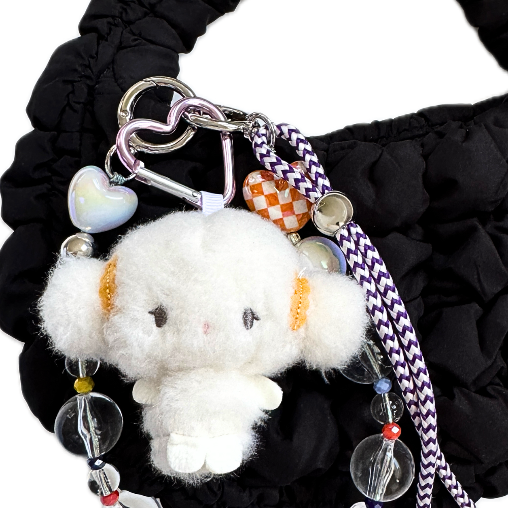 Front view of Cogimyun plush keychain with heart-shaped carabiner clip