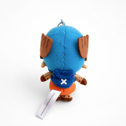 Back view of One Piece Tony Tony Chopper plush keychain bag charm featuring Chopper's blue backpack